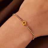 Tennisarmband aus Edelstahl, vergoldet, mit weißem kubischem Zirkonia, Buchstabe: Q