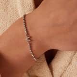 Tennisarmband aus Edelstahl, mit weißem kubischem Zirkonia, Buchstabe: V