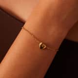 Stainless steel goldplated fantasiearmband met hanger hart voor dames