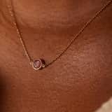 14 karaat geelgouden ketting met geboortesteen hanger Oktober