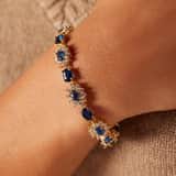 Silberarmband Zirkonia blau, vergoldet