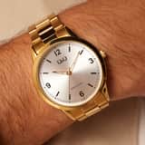 Q&Q Herrenarmbanduhr aus goldfarbenem Edelstahl C10A-052PY
