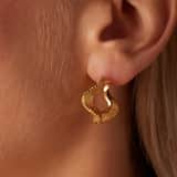 Camille stainless steel goldplated oorringen plat met bewerking voor dames