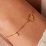 Stainless steel goldplated fantasiearmband met open hart voor dames