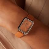 Regal dames horloge met licht oranje band