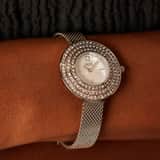 Regal dames horloge zilverkleurig, drie rijen zirkonia