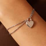 Guess stainless steel goldplated fantasiearmband voor dames