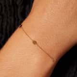 Armband aus 585er Gelbgold mit 5 runden Plättchen