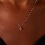 14 Karaat witgouden ketting diamant 0,175ct en topaas