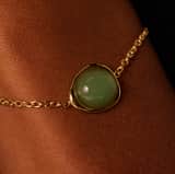 Stainless steel goldplated fantasiearmband met groen aventurijn voor dames