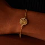 Armband aus Edelstahl, vergoldet, mit Teppichklopfer