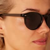 Schwarze runde Sonnenbrille