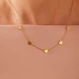 Stahlkette mit goldener Vergoldung und Herzanhängern