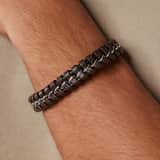 Stainless steel herenarmband gevlochten leer bruin
