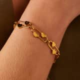 Edelstahl-Armband mit goldplattierten Herzgliedern