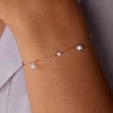14 karaat gouden armband met zirkonia en zoetwaterparel