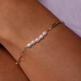 14 karaat gouden armband met zirkonia en zoetwaterparel