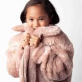 Zilveren kinderring met roze kristal