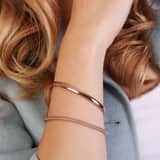Silbernes Set, rotvergoldet mit zwei Armbändern