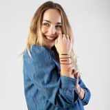 Armband, Edelstahl, mit lilafarbenen Perlen