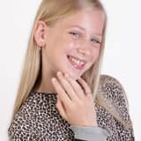 Zilveren goldplated kinderring hart met zirkonia