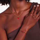 Stainless steel goldplated fantasiearmband met hanger hart met rood kristal voor dames