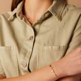 Stainless steel goldplated fantasiearmband met rozenkwarts voor dames