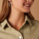 Stainless steel goldplated oorhangers bloem voor dames