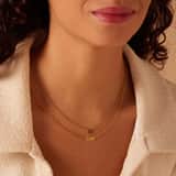 Myla stainless steel goldplated ketting met een hartje en love voor dames