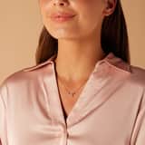 Zilveren goldplated ketting met hanger strik met zirkonia voor dames