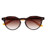 Braune runde Sonnenbrille mit Pantherprint