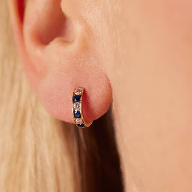 9 karaat oorringen met witte en blauwe zirkonia voor dames