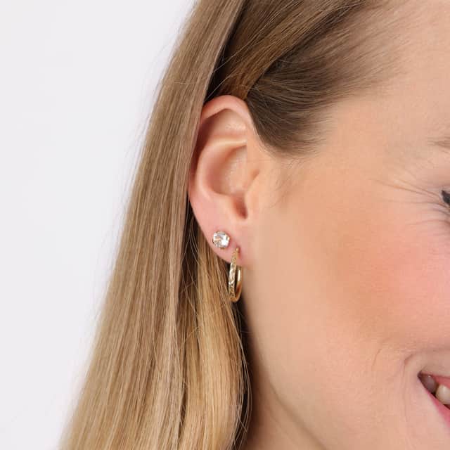 9 karaat oorringen bewerkt 15mm voor dames