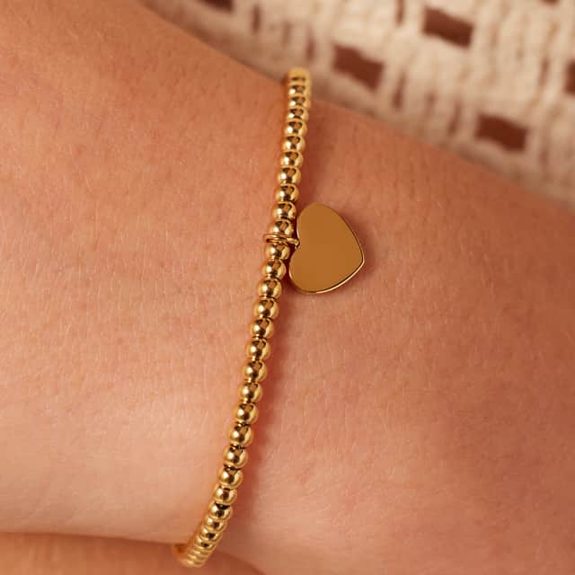 Gerecycleerd stainless steel armband gold bol/hart