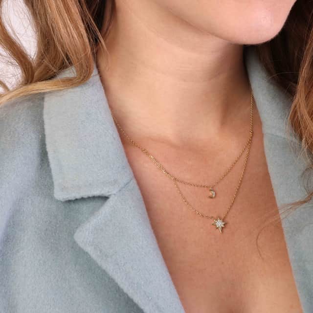 Zilveren ketting layering halve maan/galaxy ster