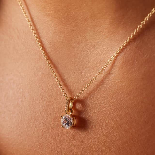 Zilveren goldplated ketting met hanger rond zirkonia