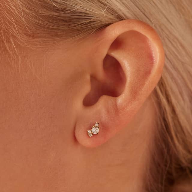 Zilveren goldplated oorknoppen asymetrisch met zirkonia voor dames