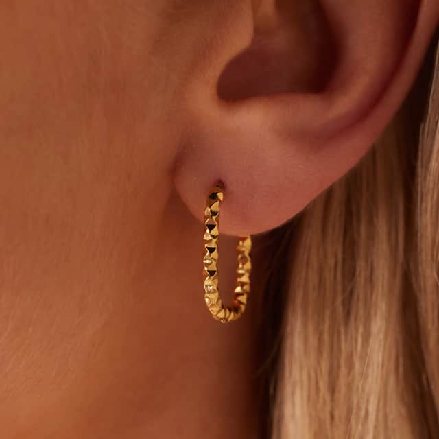 Stainless steel goldplated oorbellen ovaal bewerkt
