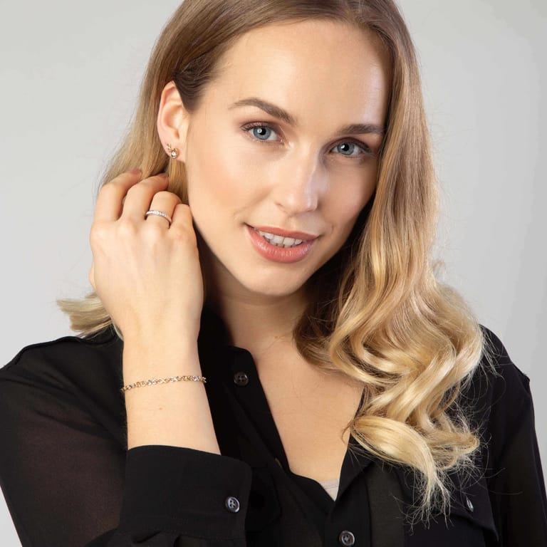 14 karaat gouden bicolor oorknoppen met zirkonia voor dames