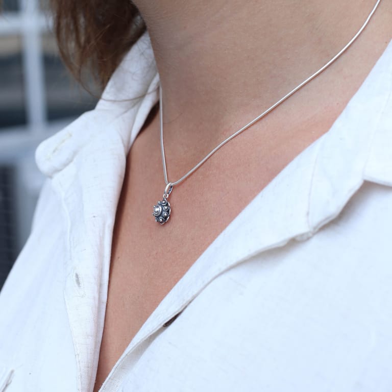 Zilveren ketting met hanger zeeuwse knoop voor dames