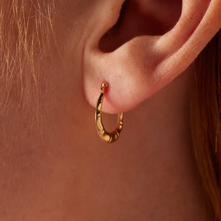 Ohrringe aus 375 Gold, oval, mit Muster