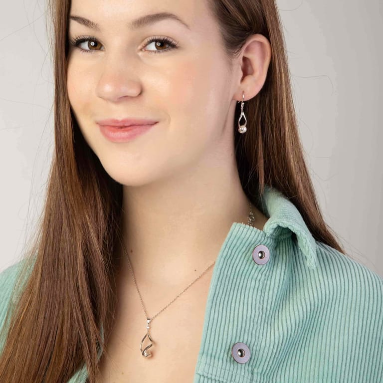 Zilveren set ketting&oorbellen met zoetwaterparel