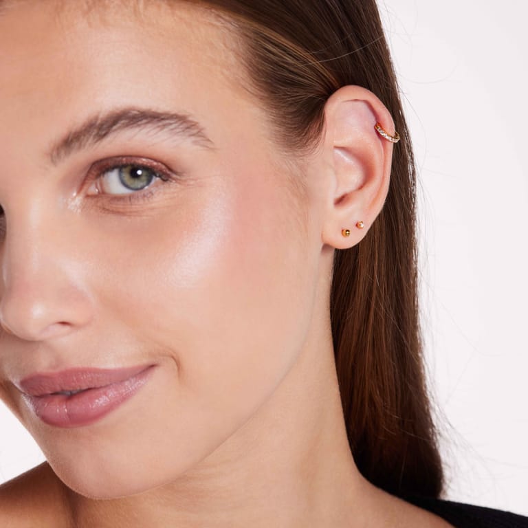 Stainless steel goldplated helixpiercing met zirkonia voor dames