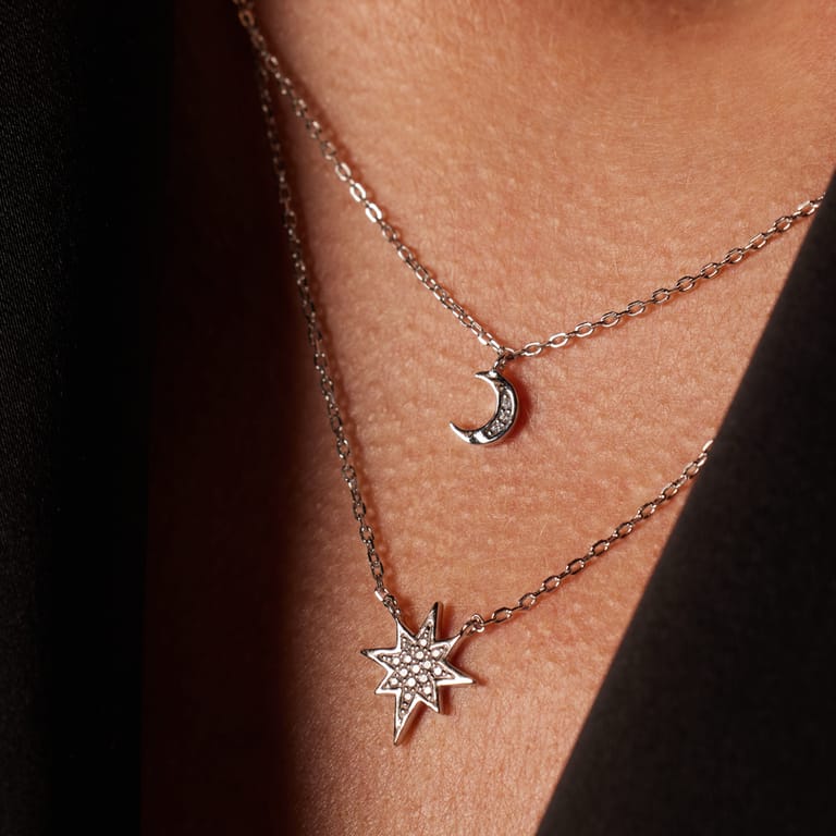 Zilveren ketting layering halve maan/galaxy ster