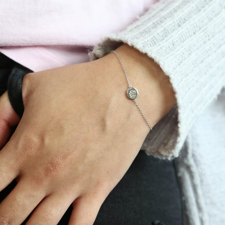 Zilveren armband disc sterrenbeeld