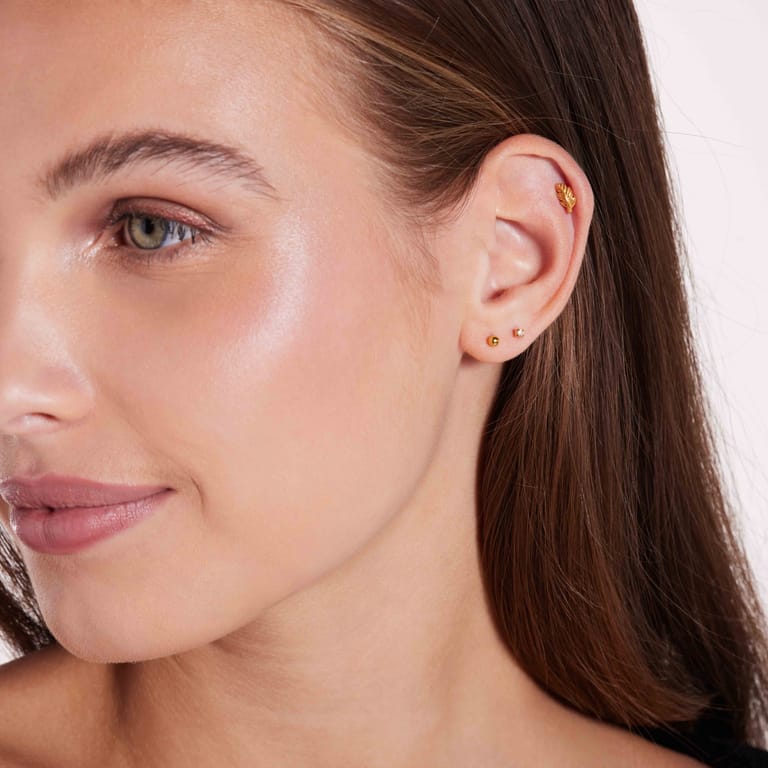 Stainless steel goldplated helixpiercing veer voor dames