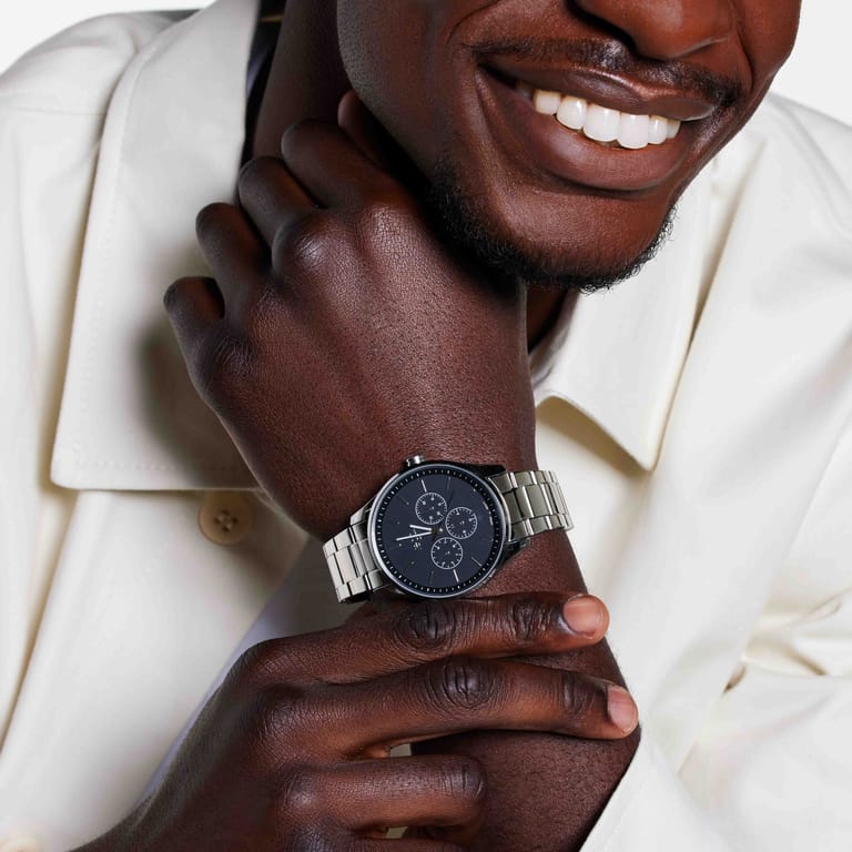 Regal herenhorloge met zilverkleurige band