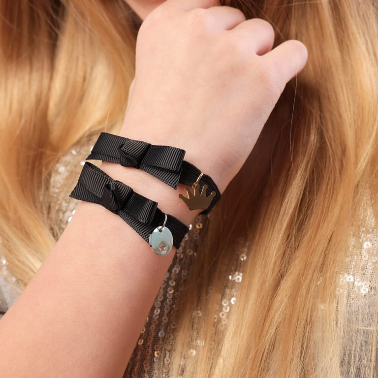 Zwarte kinderrekarmband met hanger ster