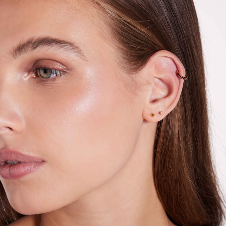 Stainless steel helixpiercing gold zwart zirkonia