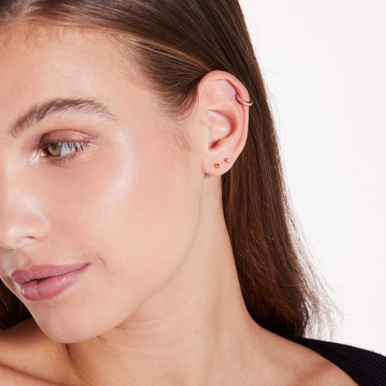 Stainless steel helixpiercing gold licht roze zirkonia